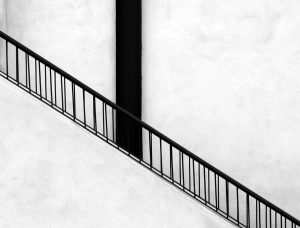 Stair along with strong white wall